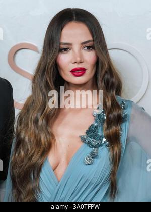 Keleigh Sperry walking on the red carpet at the The 97th Academy Awards