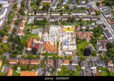 Aerial view, construction site with construction crane and new school building on the grounds of the Petri elementary school on Langenwiedenweg, Werl, Stock Photo