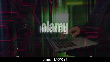 Typing on laptop, person over HACKED text and circuit board image Stock Photo