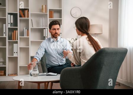 Session with psychologist. In the cabinet. Stock Photo