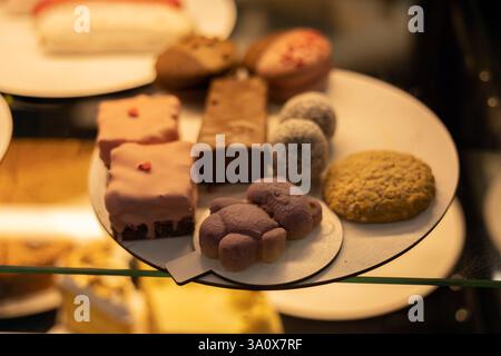 Various cakes on display in a store Stock Photo