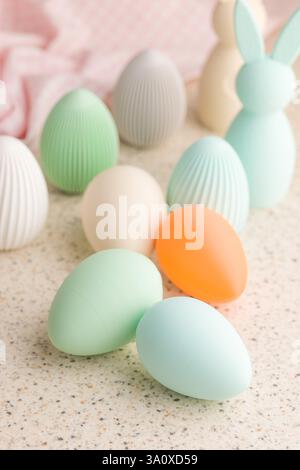 Easter decoration. Colorful eggs on kitchen table. Stock Photo