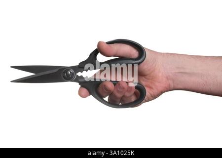 Male hand holding a pair of scissors against a white background Stock Photo