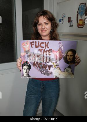 (EDITOR'S NOTE: IMAGE CONTAINS NUDITY) A naked woman rides her bike