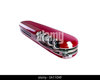 A classic red multi-tool, closed, showing a glossy finish and various tool layers including a corkscrew. Stock Photo