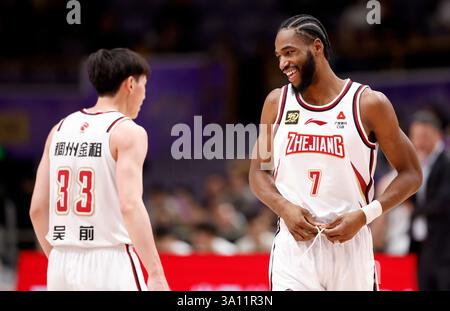Beijing, China. 6th Mar, 2025. Ruben Nembhard (R) of Zhejiang Golden Bulls reacts during the 36th round match between Beijing Royal Fighters and Zhejiang Golden Bulls at the 2024-2025 Chinese Basketball Association (CBA) league in Beijing, China, March 6, 2025. Credit: Wang Lili/Xinhua/Alamy Live News Stock Photo