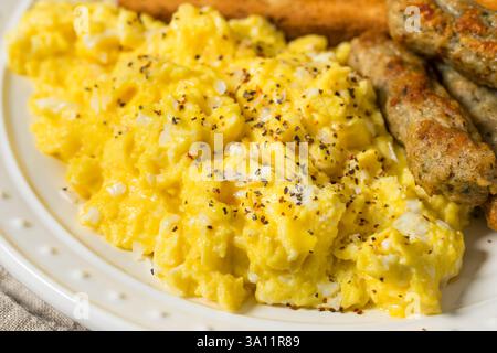 Homemade Organic Scrambled Eggs for Breakfast with Salt and Pepper Stock Photo