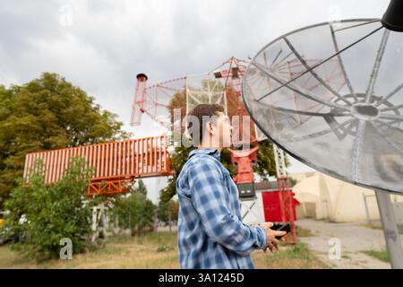 Radio telescope designer developing concepts and designing new types of telescopes, including antennas and data processing systems. Stock Photo