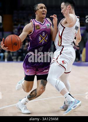 Beijing, China. 6th Mar, 2025. Travis Trice (L) of Beijing Royal Fighters competes during the 36th round match between Beijing Royal Fighters and Zhejiang Golden Bulls at the 2024-2025 Chinese Basketball Association (CBA) league in Beijing, China, March 6, 2025. Credit: Wang Lili/Xinhua/Alamy Live News Stock Photo