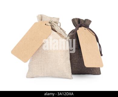 Burlap bags with tags isolated on white Stock Photo