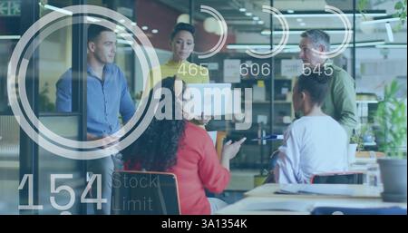 Image of data processing and circles over diverse colleagues discussing work Stock Photo