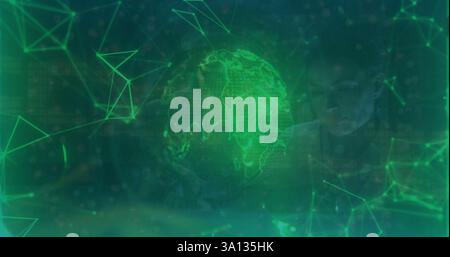 Image of green shapes and spinning globe over black background Stock Photo
