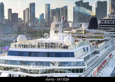 Miami, Florida, USA - 4 January 2025: Passengers on the top deck of the Norwegian Jade cruise ship docked in the Port of Miami. Stock Photo