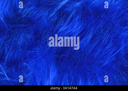 Close up of bright blue tousled synthetic fake fur Stock Photo