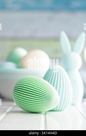 Easter decoration. Colorful eggs on a white table. Stock Photo