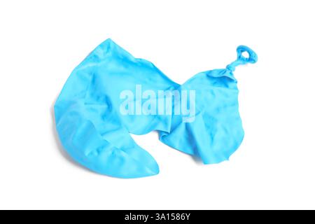 One blue popped balloon isolated on white Stock Photo