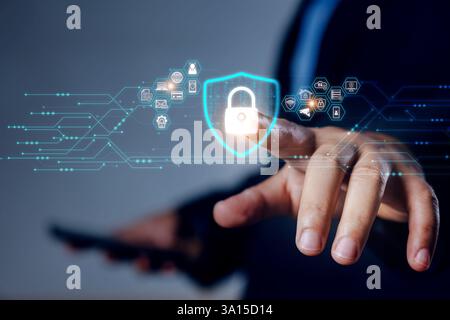Cybersecurity and privacy concepts to protect data. Business Finger press on lock icon and internet network security technology. Virtual screen interf Stock Photo
