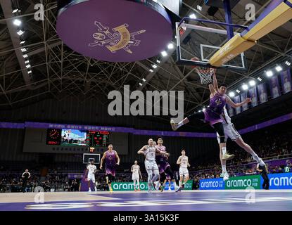 Beijing, China. 6th Mar, 2025. Liao Sanning (front) of Beijing Royal Fighters dunks during the 36th round match between Beijing Royal Fighters and Zhejiang Golden Bulls at the 2024-2025 Chinese Basketball Association (CBA) league in Beijing, China, March 6, 2025. Credit: Wang Lili/Xinhua/Alamy Live News Stock Photo