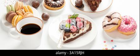 Table with various cookies, donuts, cakes, cheesecakes and coffee cup Stock Photo