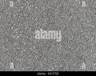 Rough gray asphalt pavement surface. New asphalt texture. A frame filled with the textured surface of dry asphalt. Asphalt road grey texture. Road bac Stock Photo