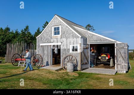 Canada, Nova Scotia province, West Pubnico, French-speaking Acadian community, the historic Acadian village of Nova Scotia, barn and old Ford T car Stock Photo
