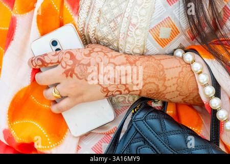 India, Ladakh state, Leh city, woman's tattooed arm Stock Photo