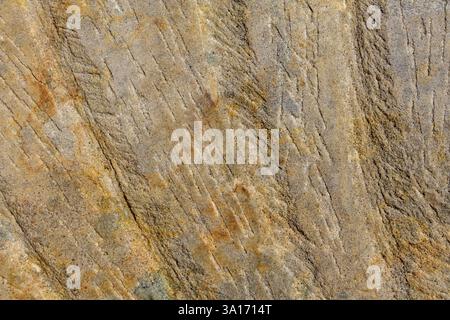 Close-up of natural stone patterns, showcasing unique textures, cracks, and organic formations. Ideal for background and texture Stock Photo