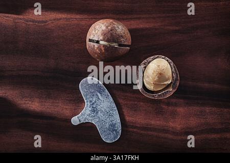 .Macadamia Nuts On Vintage Wooden Board Stock Photo