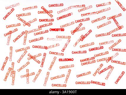 Wallpaper with the word cancelled in red on a white background. Stock Photo