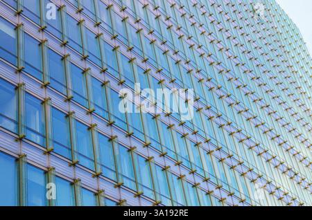 Charlemagne building wall modernism architecture style, modern high-rise office building, abstract details of facade glass curtain wall, patterned gla Stock Photo