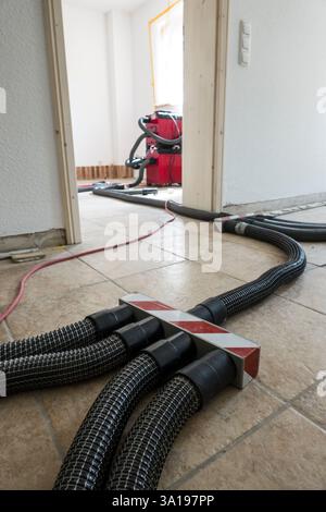 Wet screed is dried in a special process Stock Photo