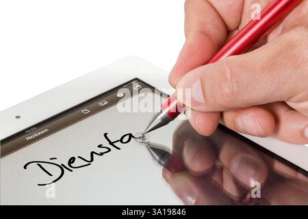 Detail of ananonymous person writing on a tablet with types using a pen Stock Photo