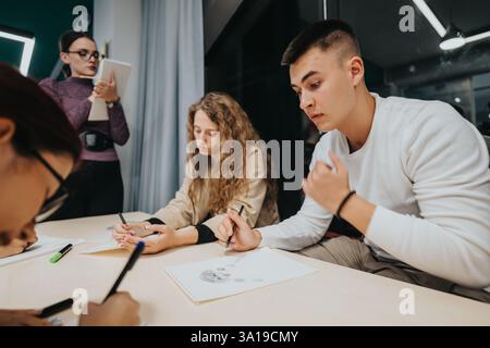 Students collaborating on creative projects in classroom setting Stock Photo