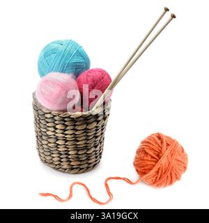Multicolored balls of yarn and knitting needles isolated on white background. Collage. Stock Photo