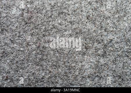gray synthetic fiber felt background texture macro image Stock Photo