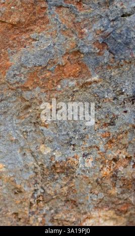 Close up dark gray stone with textures. Natural stone,graphic resource for backgrounds with selective blur.High quality. Copy space. Ideal format for Stock Photo