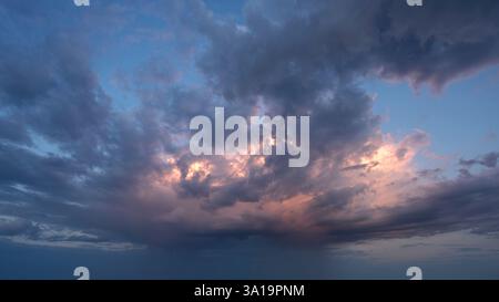 Low angle view to evening sky with dramatic clouds Stock Photo