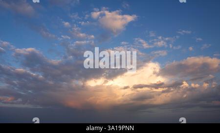 Low angle view to evening sky with dramatic clouds Stock Photo