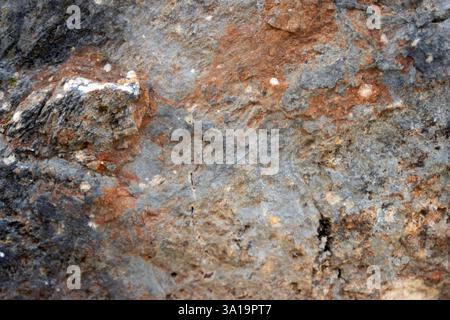 Dark gray stone with textures. Closeup. For design. Grunge gray banner Horizontal graphic resource for backgrounds with selective blur.High quality. C Stock Photo