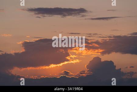 Evening sky with pastel-colored clouds Stock Photo