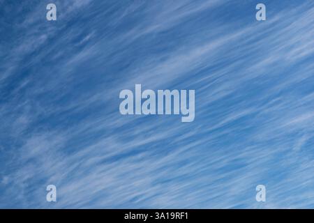 White clouds on a blue winter sky Stock Photo