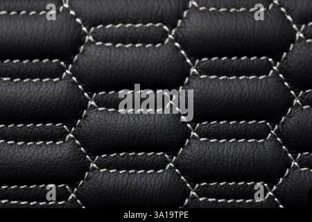 Close up view of automotive leather with the complex stitching pattern Stock Photo
