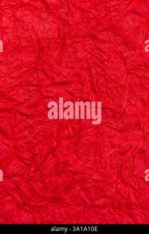 Background surface of wrinkled red and crumpled paper. Stock Photo