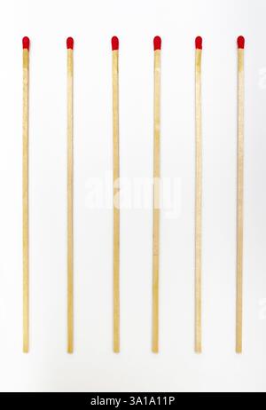 Many matches sticks for lighting a fire on white background. Stock Photo