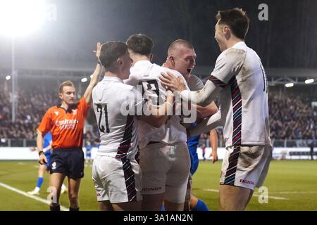 England's Angus Hall (centre) celebrates scoring their side's fourth ...