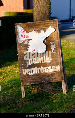 Photomontage, Torn-off election poster for the Bundestag election with the inscription politically disenchanted Stock Photo