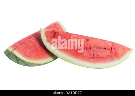 A close-up image of two fresh watermelon slices showing vibrant red flesh and green skin. Stock Photo