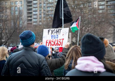 People protesting Donald Trump and Elon Musk at the Boston Commons in ...