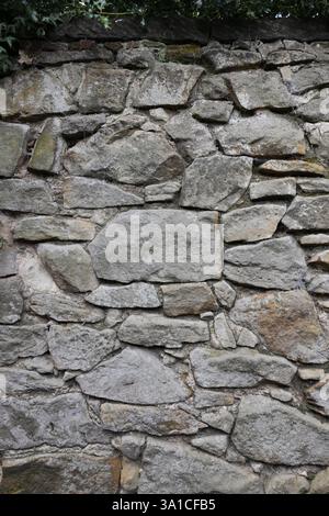 Rough texture of wall made of small gray cement pebbles Stock Photo - Alamy