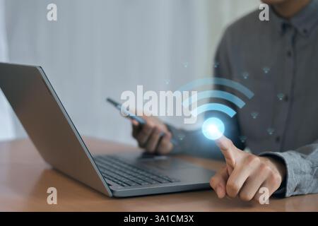 Wifi icon on businessman's hand, wireless communication concept, business, society, global Stock Photo